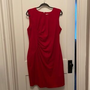 Calvin Klein red sheath dress. Lined. Flattering ruched front.